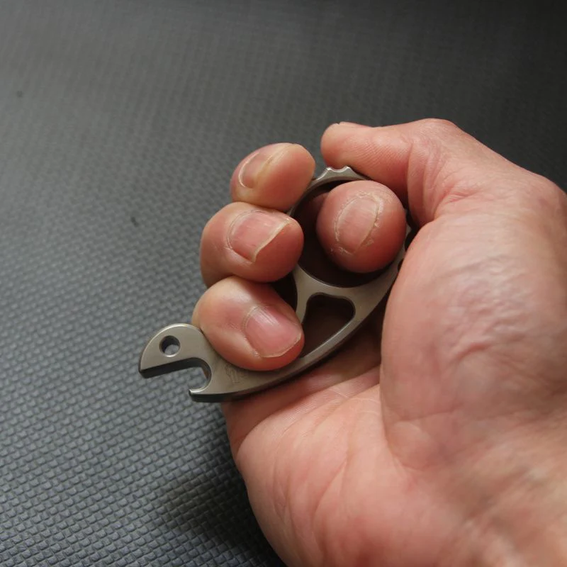 Titanium Snail Knuckle Duster Multi-function Bottle Opening EDC Tool - Image 3